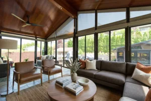 3-season glass sunroom providing a bug-free outdoor space in fall.