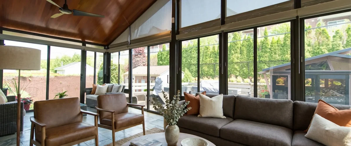 3-season glass sunroom providing a bug-free outdoor space in fall.