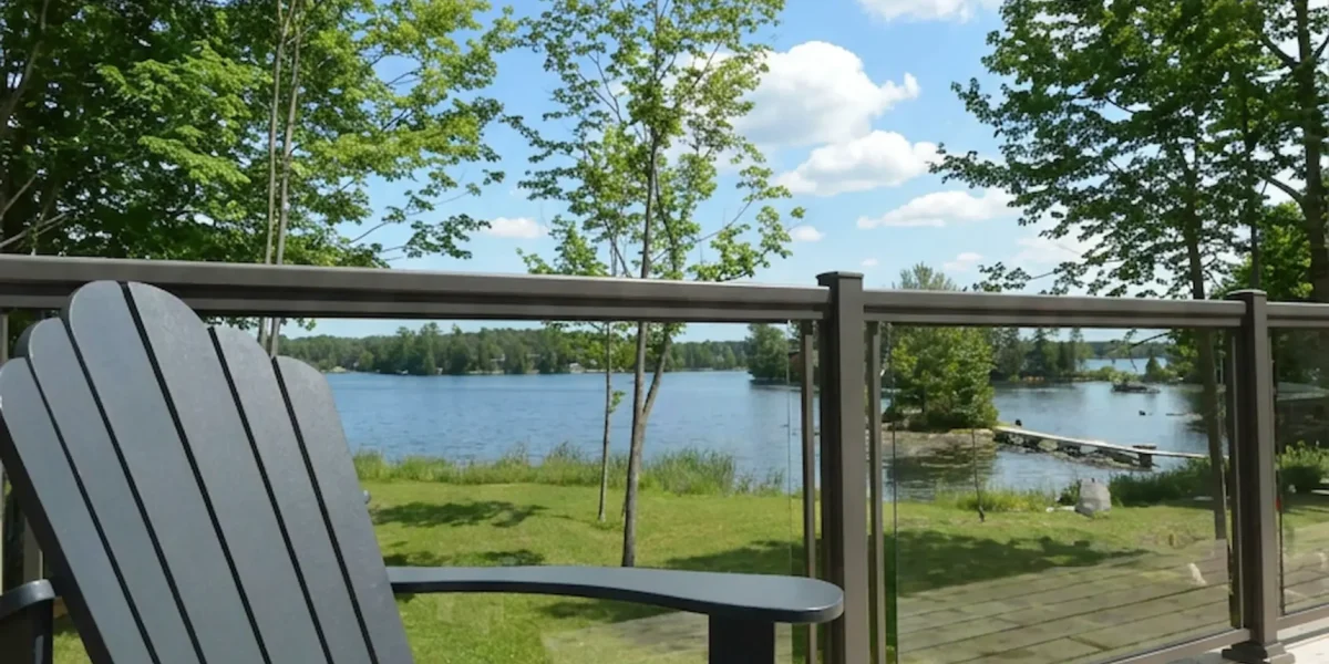 Glass railings on a Columbus deck providing wind protection.