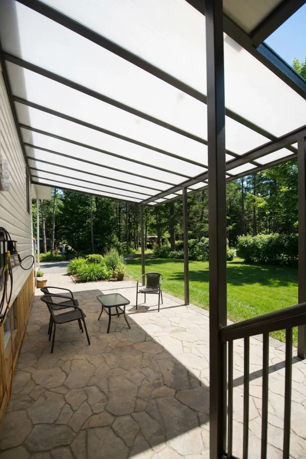 Acrylic patio cover protecting an Ohio outdoor space from fall UV rays.