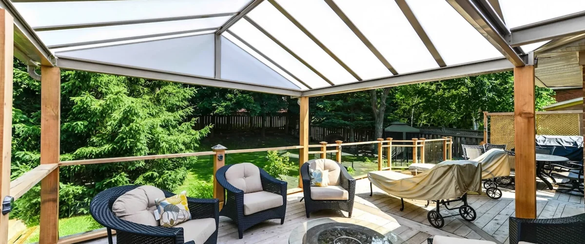 Acrylic patio cover protecting an Ohio outdoor space from fall UV rays.